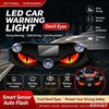LED car warning light featuring devil eyes design installed on a vehicle's front bumper.