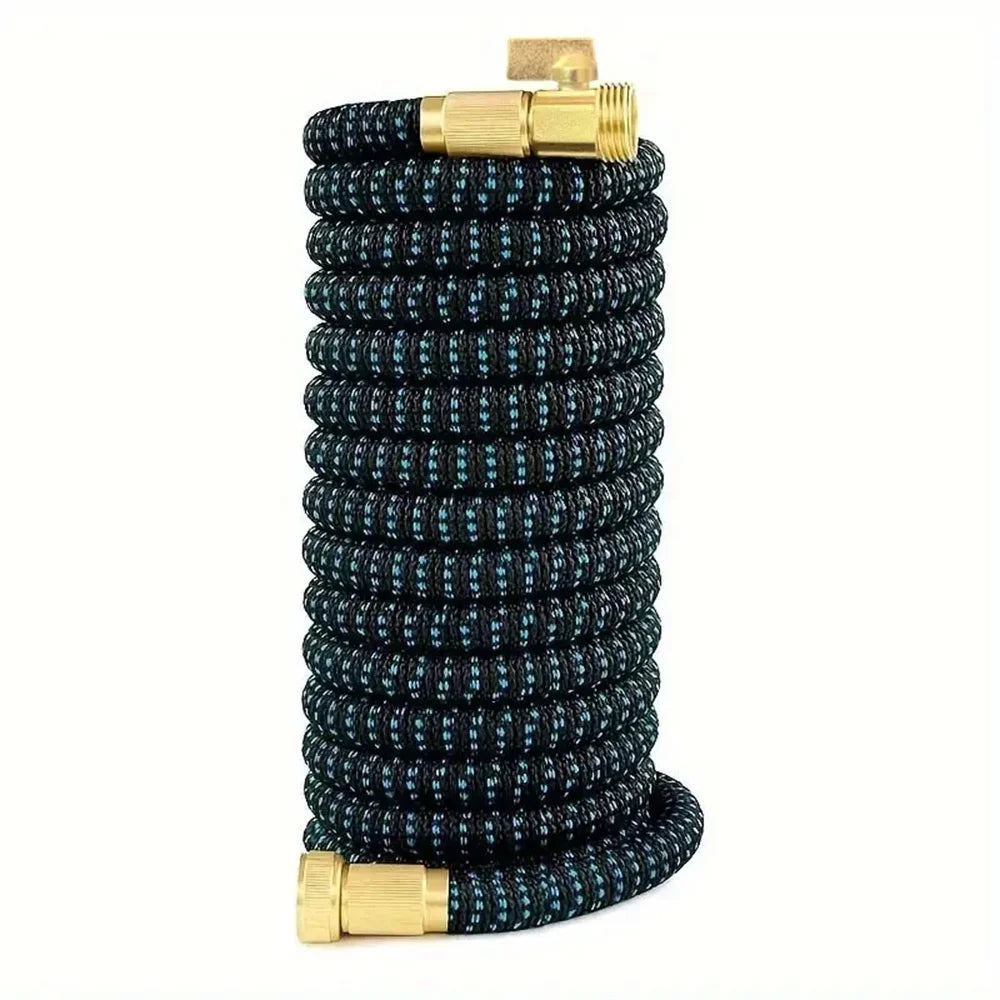 Black expandable telescopic garden hose with brass fittings coiled for storage