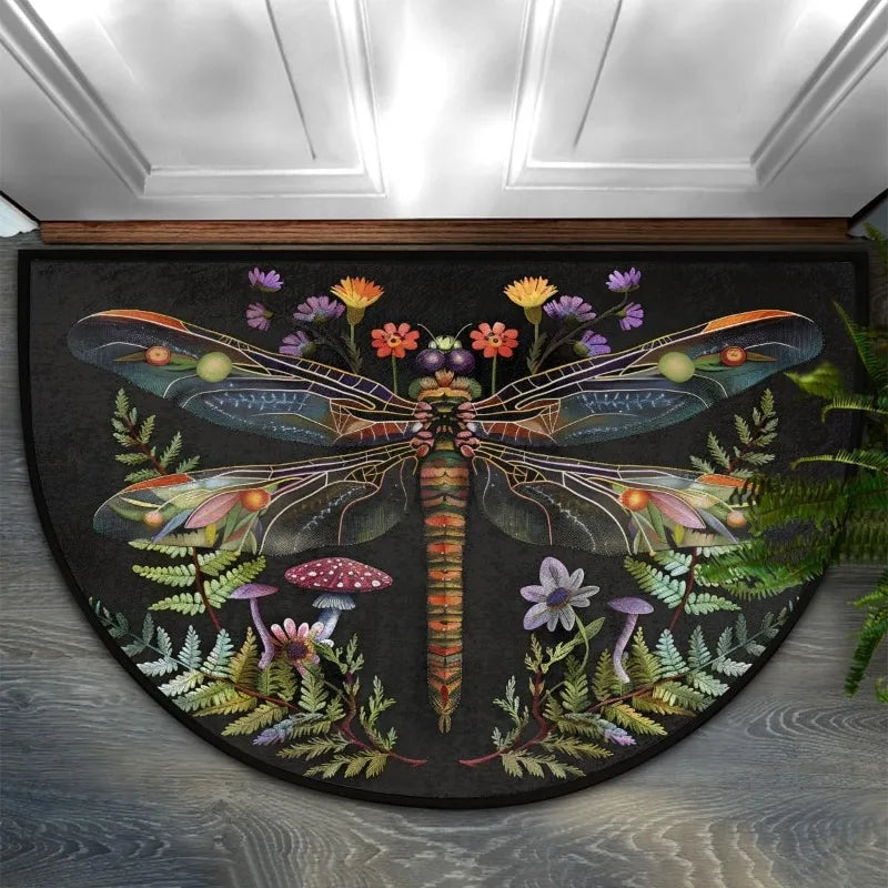 A half-round doormat featuring a dark background with colorful floral and dragonfly designs.