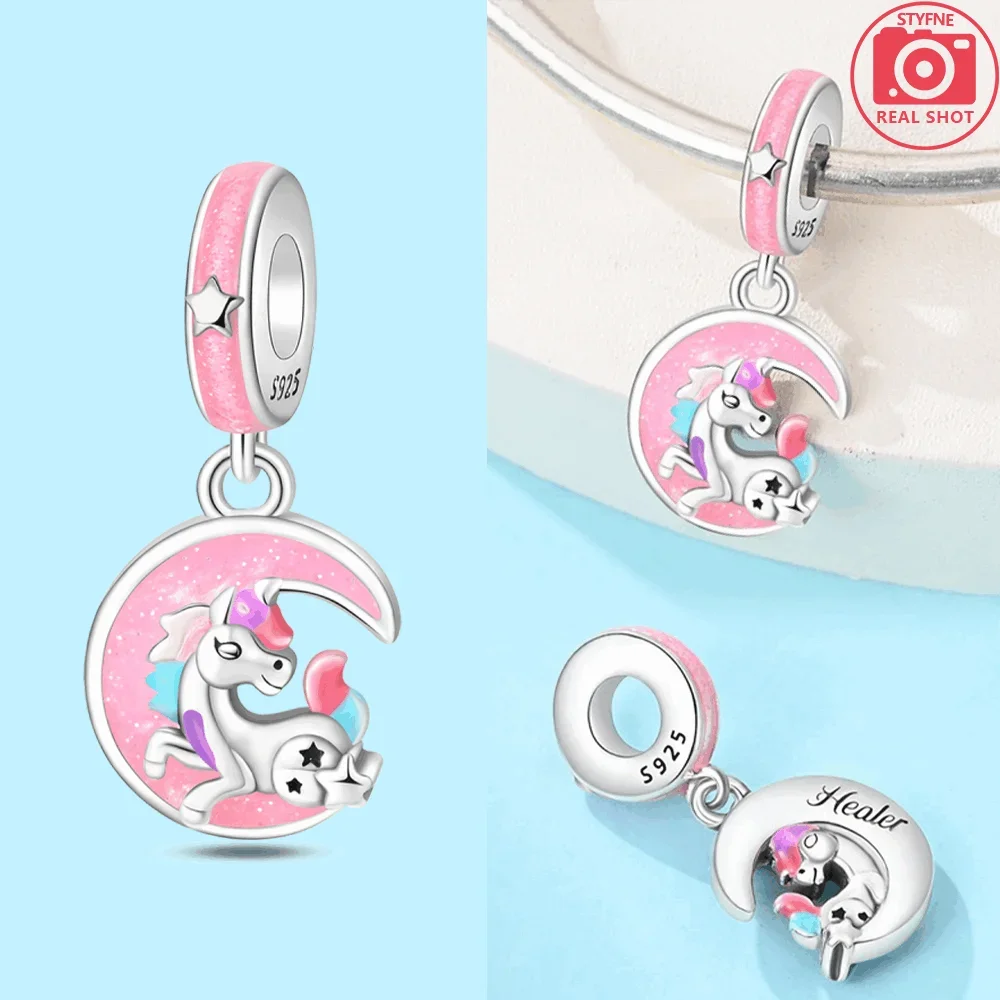 Silver unicorn pegasus charm with pink and blue rainbow accents and sparkling crystals