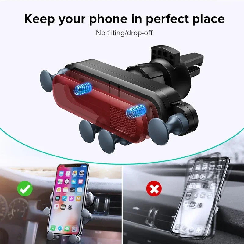 A red and black gravity phone mount designed to keep a phone in place in a car air vent.