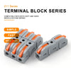 A set of gray lever wire connectors with orange insulation used for electrical connections.