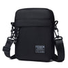 Black mini crossbody phone bag with adjustable strap shown against a white background.
