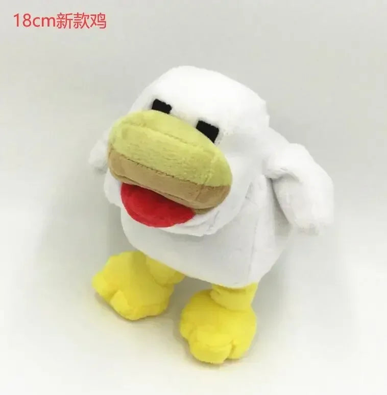 A white soft plush doll resembling a Minecraft character, possibly Steve or Creeper, with yellow features.
