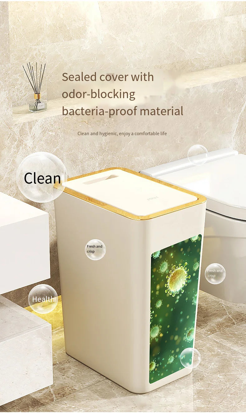 A white pop-up slim trash can with a gold lid is shown next to a toilet, emphasizing its sealed odor-blocking and bacteria-pr