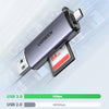 Silberes UGREEN USB 3.0 Kartenlesegerät mit Geschwindigkeitsangaben auf hellem Hintergrund.
