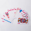 A fan of classic poker playing cards showing a deck of cards from 5 to Ace.