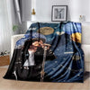 A dark blue and black printed flannel throw blanket featuring a portrait of Michael Jackson.