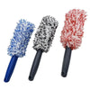 Three super plush wheel cleaning brushes in blue, black, and red with ergonomic handles