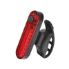 A black USB rechargeable bicycle tail light with a red lens and a mounting clip.