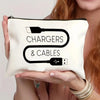 A cream canvas storage pouch featuring a black charger and cable design.