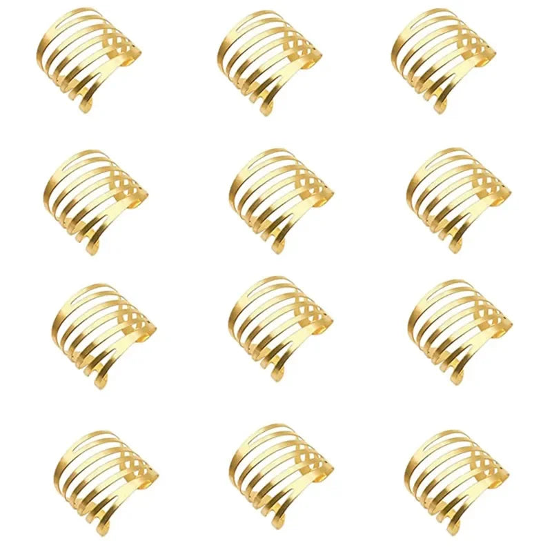 A set of twelve decorative gold metal napkin rings featuring a hollow-out pattern.