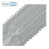 Grey self-adhesive waterproof tile stickers arranged in a staggered, stepped pattern.