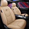 Tan leather car seat covers with headrests and side bolsters shown inside a vehicle cabin.