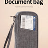 A gray document bag designed to make the journey easier, holding a passport certificate package.
