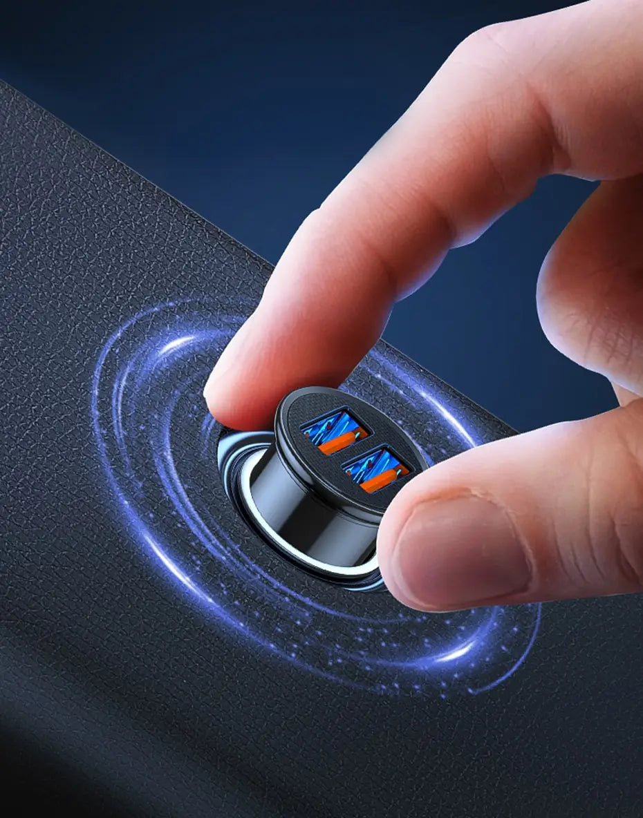 A hand is pressing a dual-port USB-C car charger into a device, showing a blue energy ring effect.