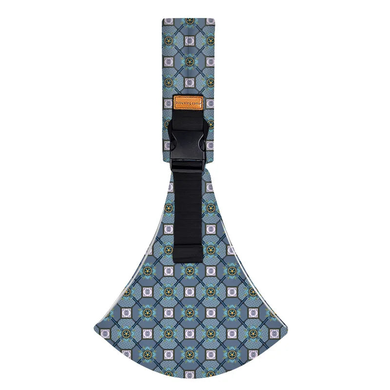 Ergonomic baby sling carrier with a patterned fabric and black strap.