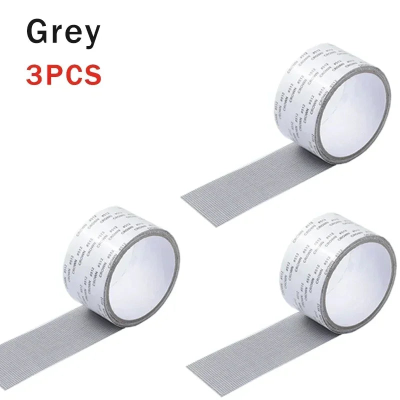 Grey self-adhesive fiberglass screen repair tape in three pieces rolled on a strip