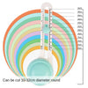 Adjustable circular paper cutter showing a set of concentric colored blades and a measuring scale.