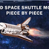 A detailed wooden space shuttle model kit is shown mid-launch against a dark starry background.