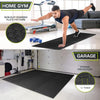 Black interlocking foam exercise mats shown in use for home gym and garage flooring with a close-up of the non-slip diamond p