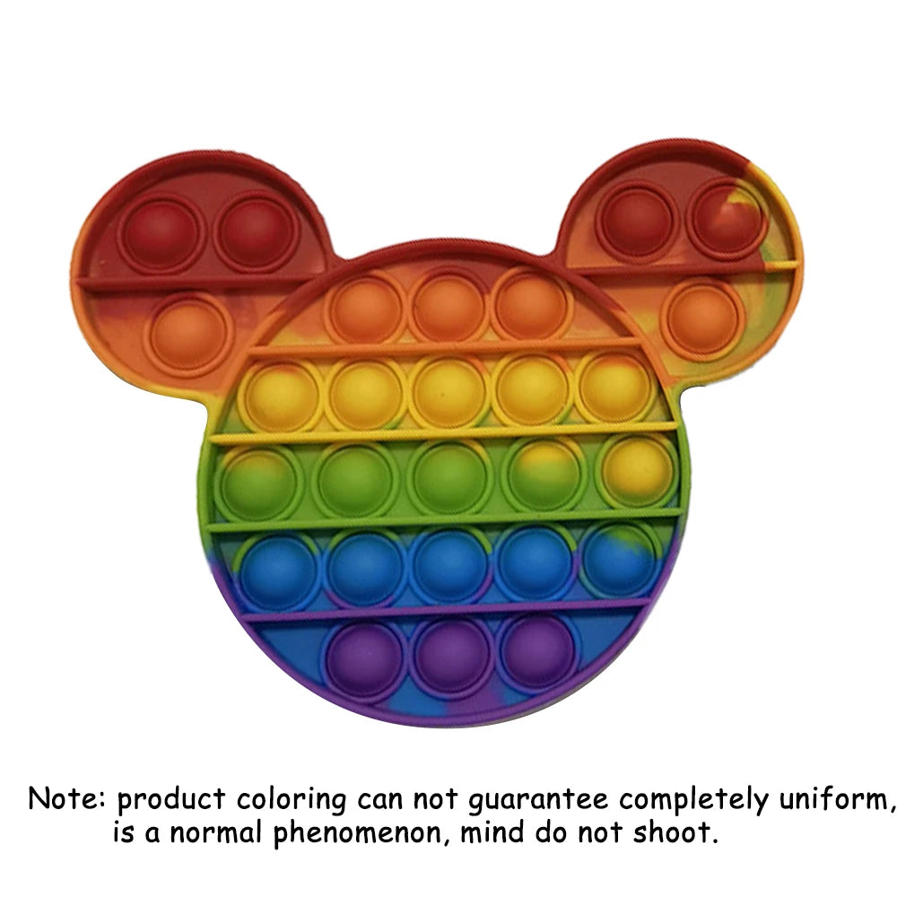 A colorful, multi-colored Pop-It fidget board shaped like Mickey Mouse's head.