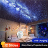 A projector lamp displaying a starry night sky projection in a bedroom setting.