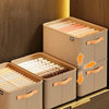 A set of light beige fabric storage boxes with wooden handles, organized for drawer and closet use.