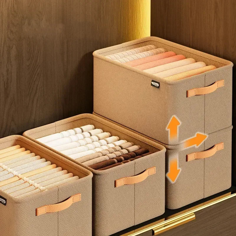 A set of light beige fabric storage boxes with wooden handles, organized for drawer and closet use.
