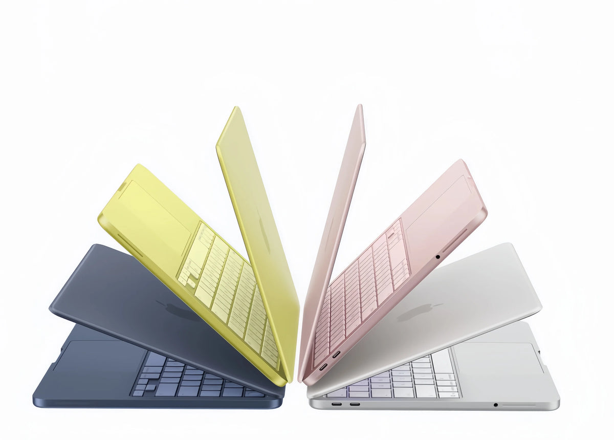 A collection of three laptop cases, including a yellow, a pink, and a silver one, displayed against a white background.