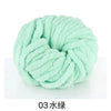A ball of light mint green chunky acrylic yarn for knitting and crochet