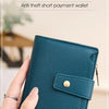 A teal anti theft short payment wallet is held in a hand, showing its texture and design.