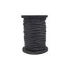 A spool of black waxed thread used in a professional leather sewing kit.