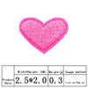 A pink heart shaped embroidery patch with the product data label underneath.