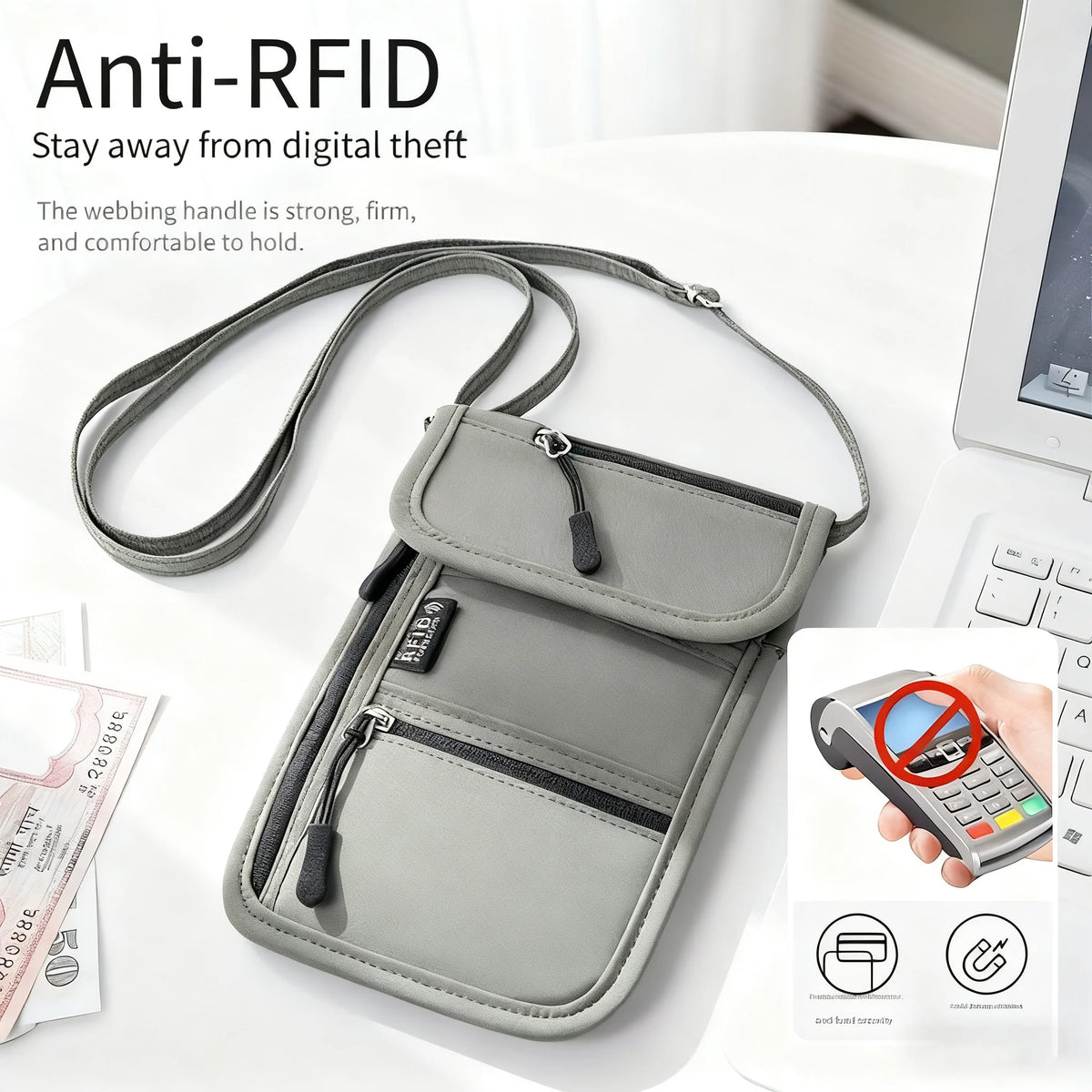 Graues RFID-blockierendes Reisedokumenten-Halter neben einem Laptop, das Schutz vor digitalem Diebstahl betont.