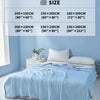 A light blue cooling summer quilt is displayed on a bed, with various size options listed nearby.