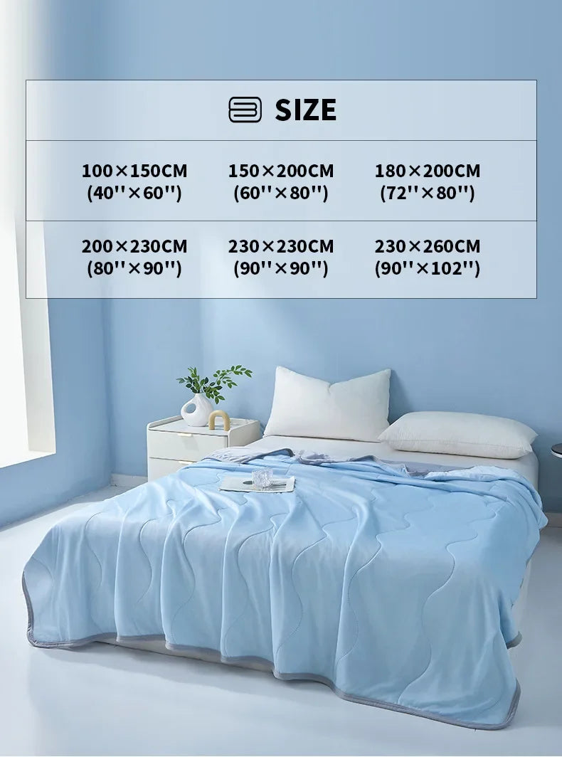 A light blue cooling summer quilt is displayed on a bed, with various size options listed nearby.