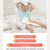A baby is exploring and tearing white paper, demonstrating sensory exploration and muscle exercise.