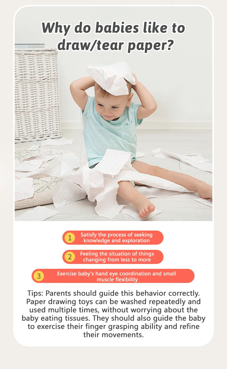 A baby is exploring and tearing white paper, demonstrating sensory exploration and muscle exercise.