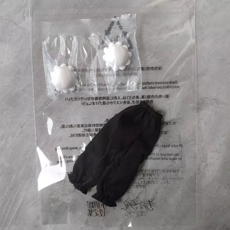 A sealed plastic bag containing an articulated BJD collectible figurine in a blind box series.
