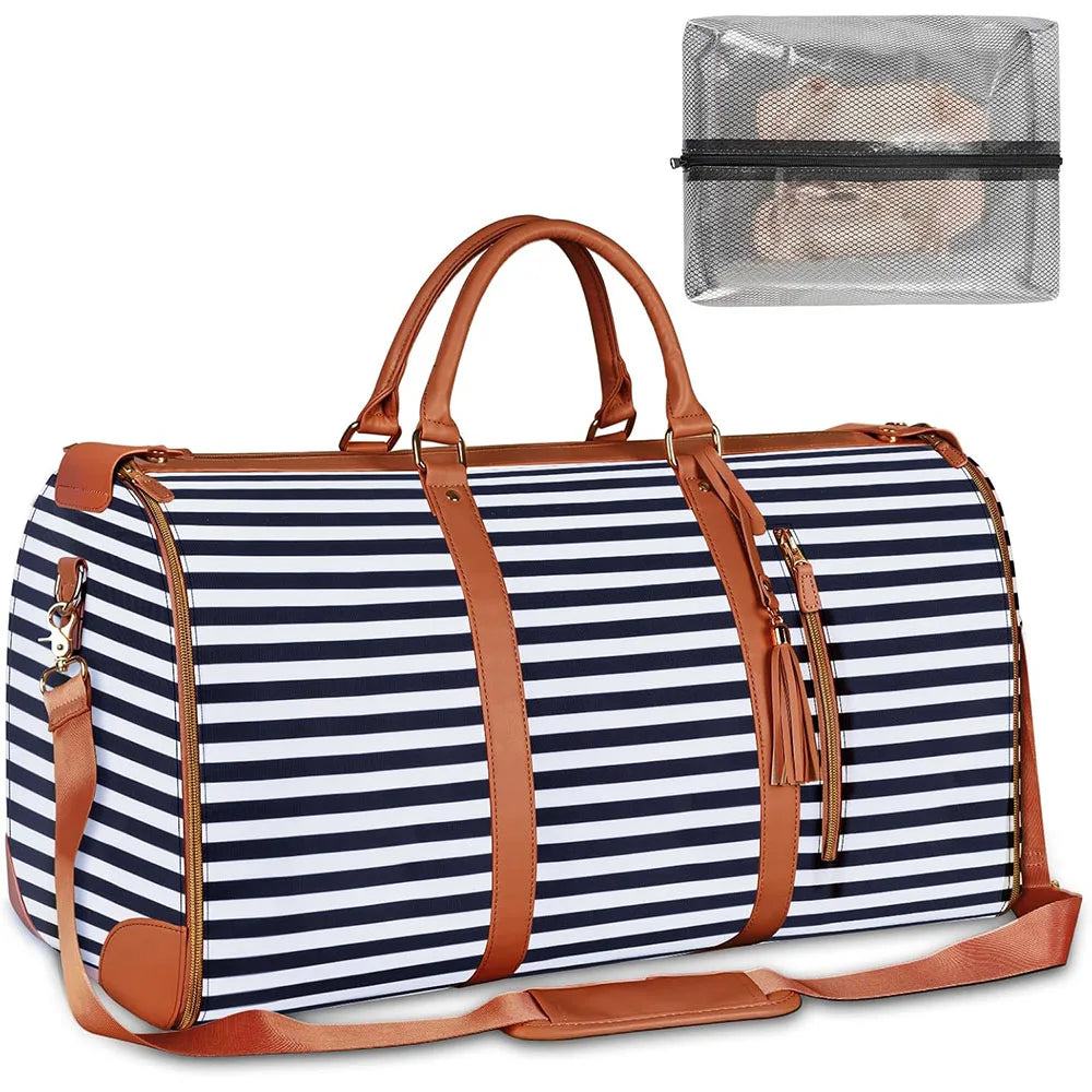 A striped navy and white duffel bag with brown leather straps and an attached clear plastic shoe pouch.