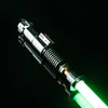 A silver lightsaber with a green blade is shown against a black background.