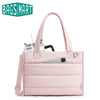 A pink multi-functional boxy tote bag with a handle and pocket is shown against a white background.