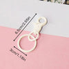 White handcrafted rhinestone bag charms featuring a sequin octopus and turtle pendant keychains