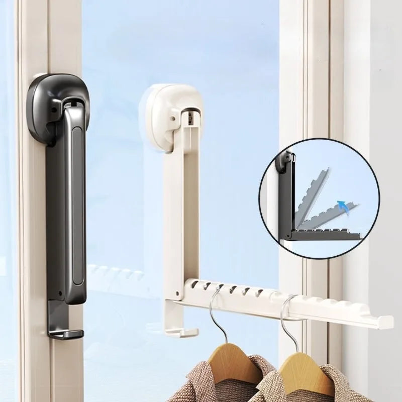 A wall-mounted clothes drying rack with an adhesive mount is shown installed on a window frame.