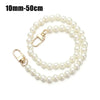 A delicate strand of white pearls used as a chain strap for bags or DIY purses.
