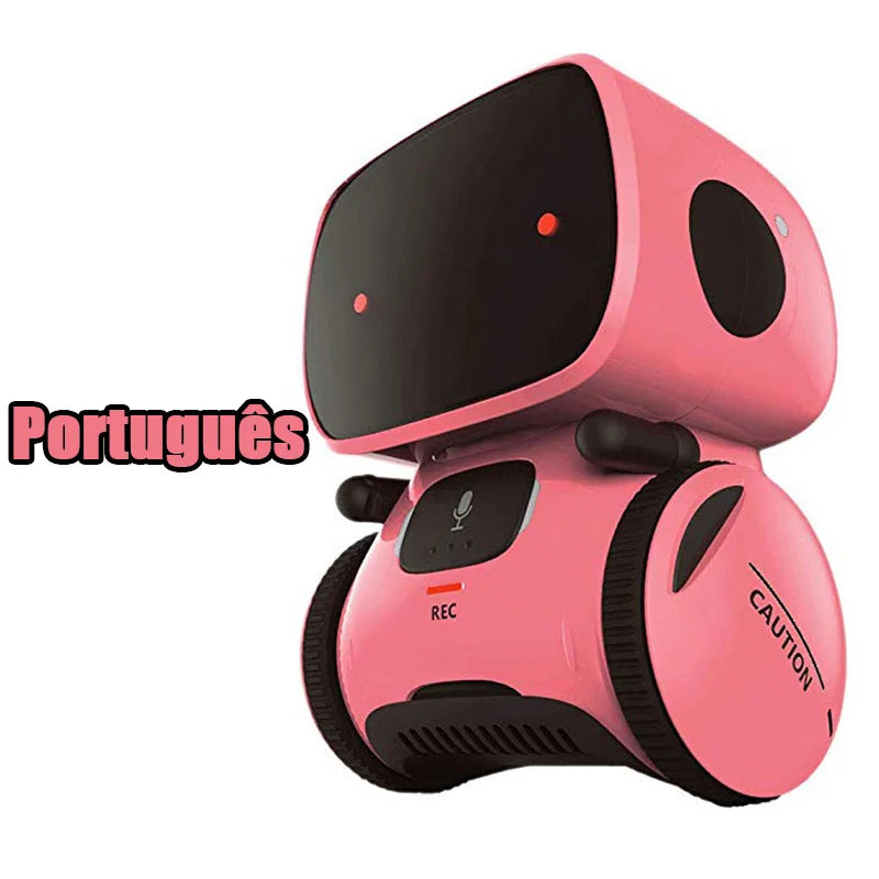 A pink interactive voice-controlled robot toy with a black head and body, labeled for Portuguese language support.