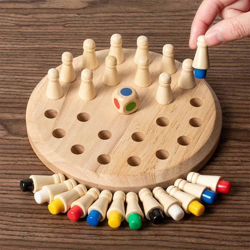 A hand is placing wooden chess pieces into holes on a circular wooden board for a memory game.