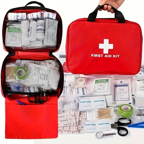 A red compact first aid kit is shown open and closed, displaying various medical supplies like bandages, wipes, and tools.