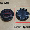 A close-up view of a black Nissan wheel center hub cap with a red ring, shown next to a magnified detail of the cap.